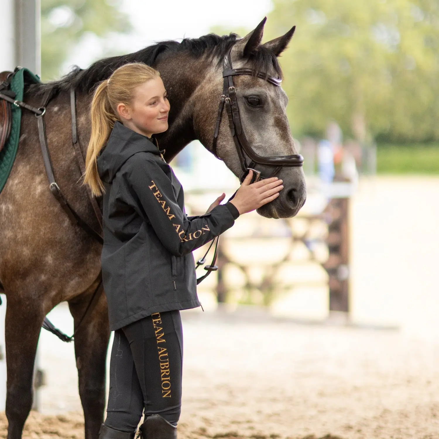 Shires Aubrion Young Rider Black Team Waterproof Jacket - 9-10 Years